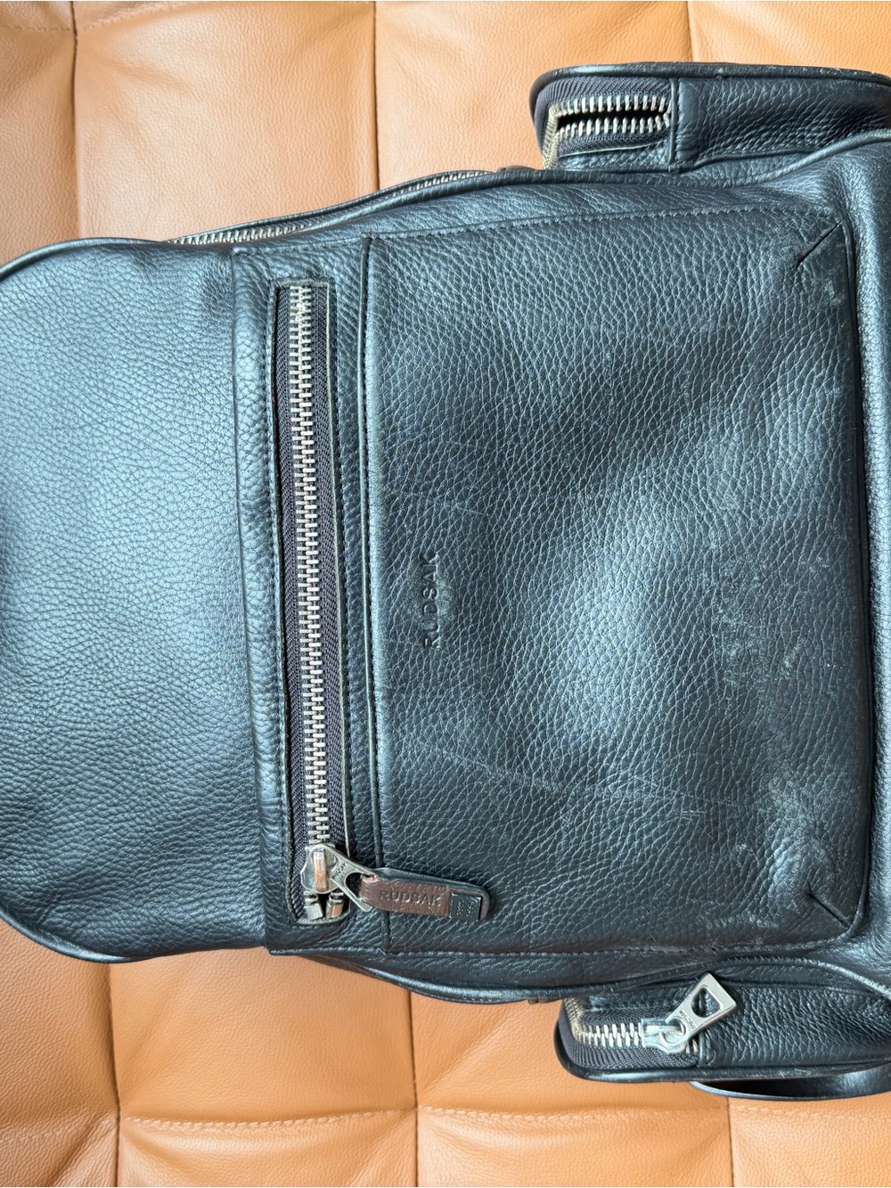 RUDSAK Black Pebbled Leather Sling Backpack